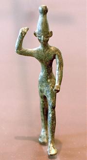 Baal, right arm raised. Bronze figurine, 14th-12th centuries, found in Ras Shamra (ancient Ugarit)